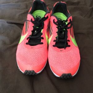 Nike racing shoes size 9 for men/size 11 for women